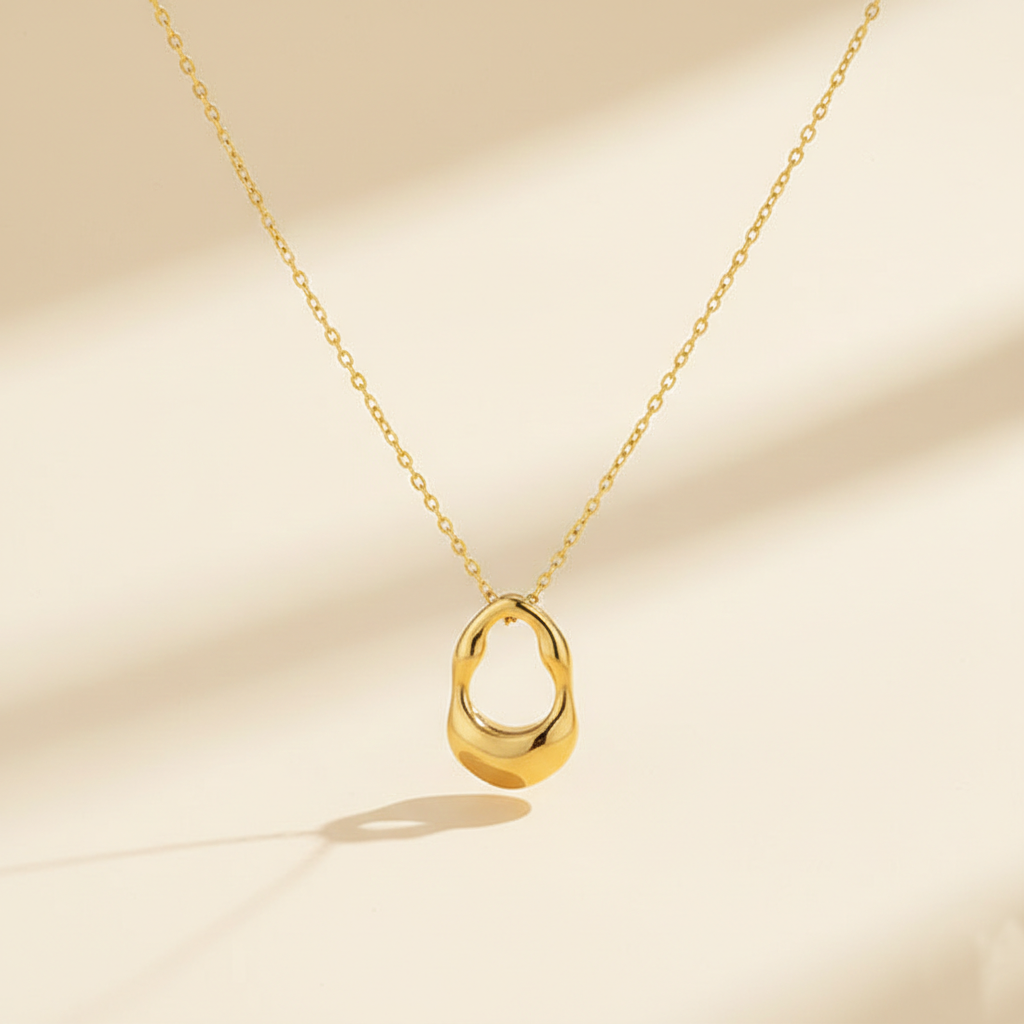 Gold Sculptural Pendant Necklace