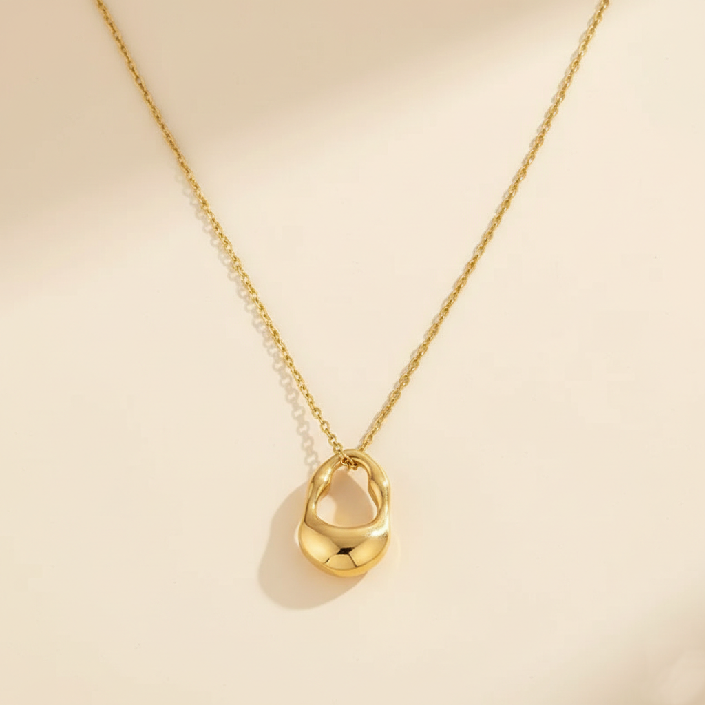 Gold Sculptural Pendant Necklace